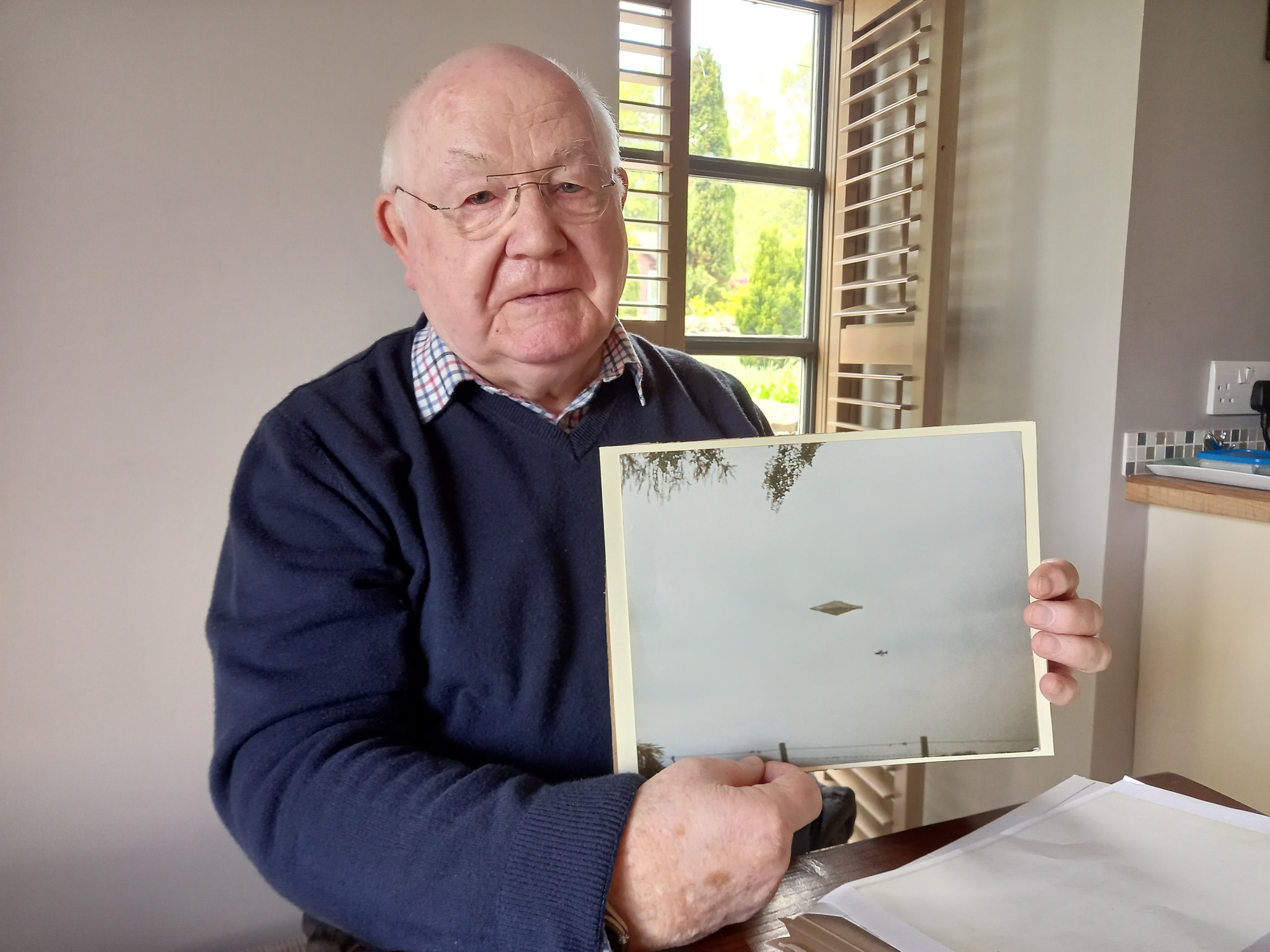 Craig Lindsay holding the print, May 2022.