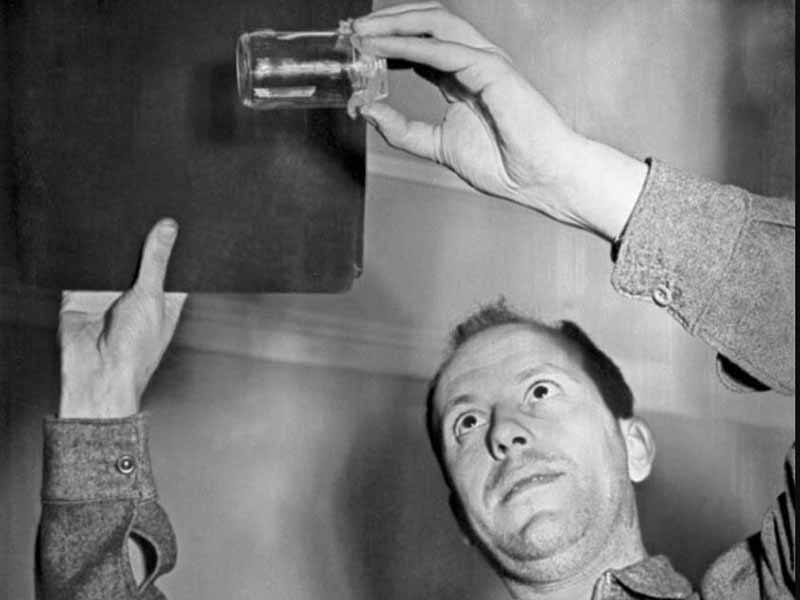 A man examining the substance after the sighting; unverified