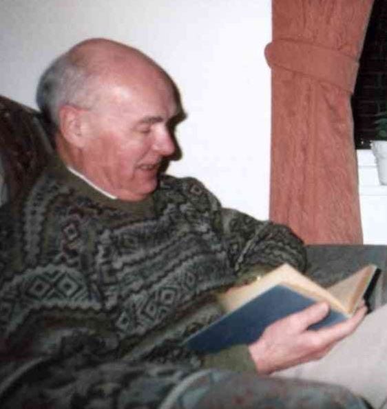 Venom navigator John Brady with his flying logbook, Norwich, 2002
