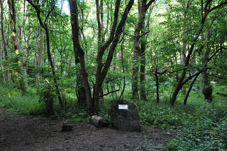 Stone and plaque marking the site of the incident.