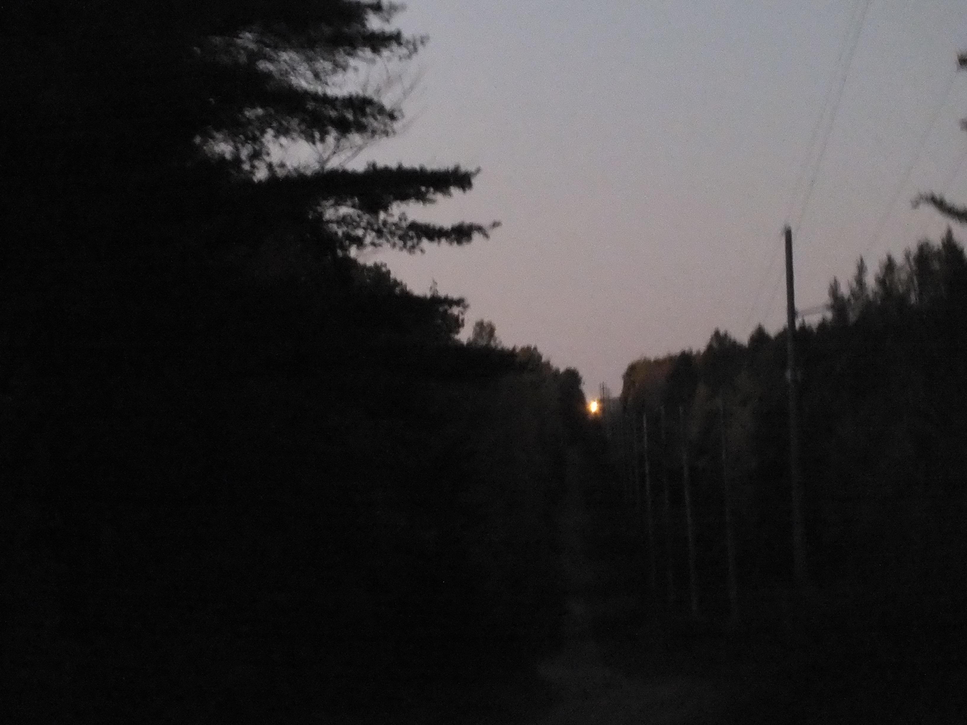 The Paulding Light at night from Robbins Pond Road