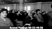1960 newsreel frame: procession and enshrinement