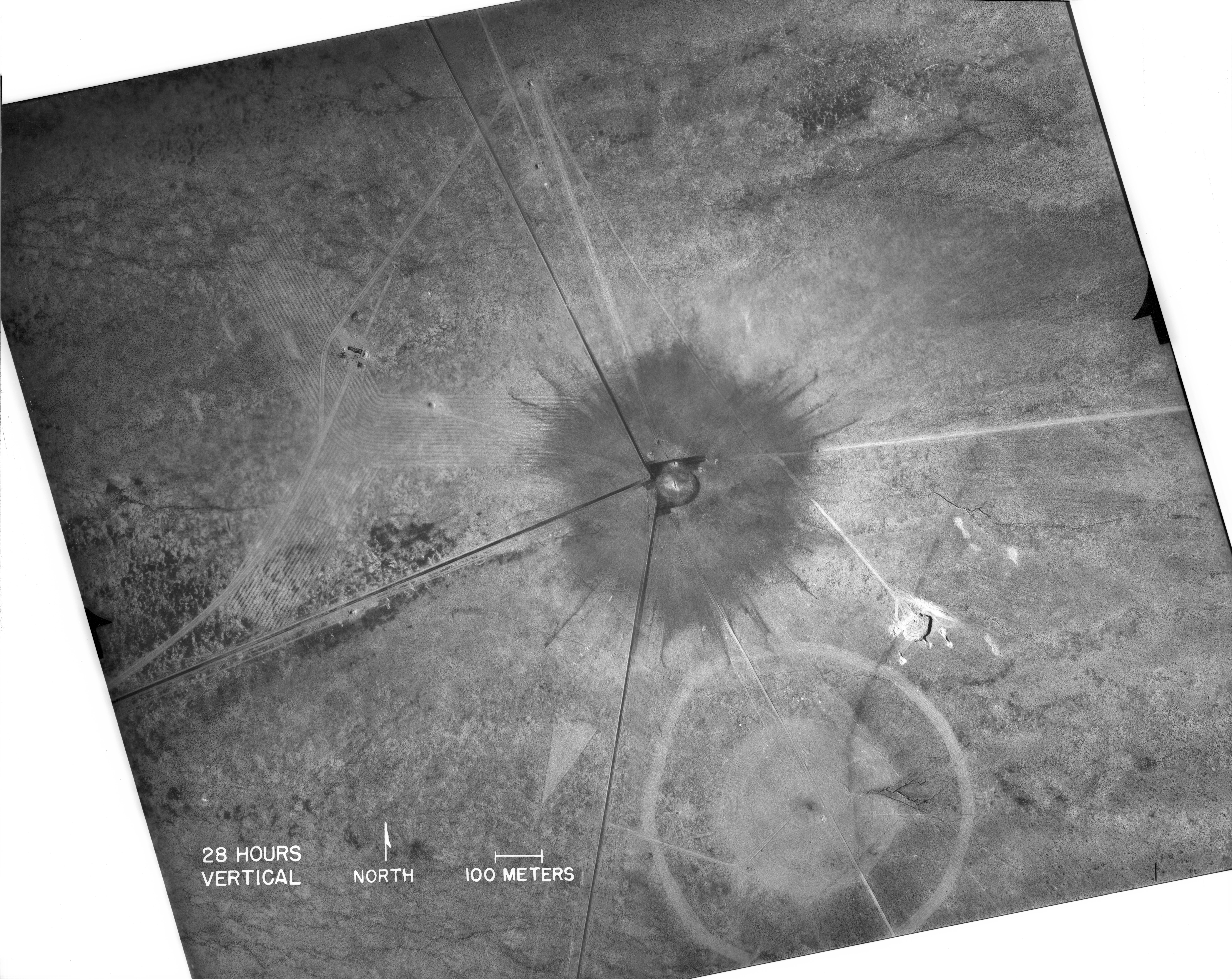 Aerial view of the Trinity crater, 28 hours after the July 16, 1945 atomic test. Context only, not the claimed crash.