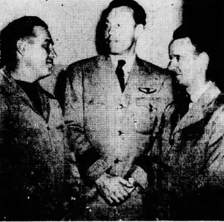 Kenneth Arnold, Captain Emil J. Smith and First Officer Ralph Stevens comparing notes, July 1947